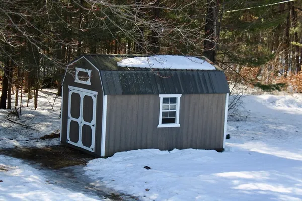 a view of backyard of a house