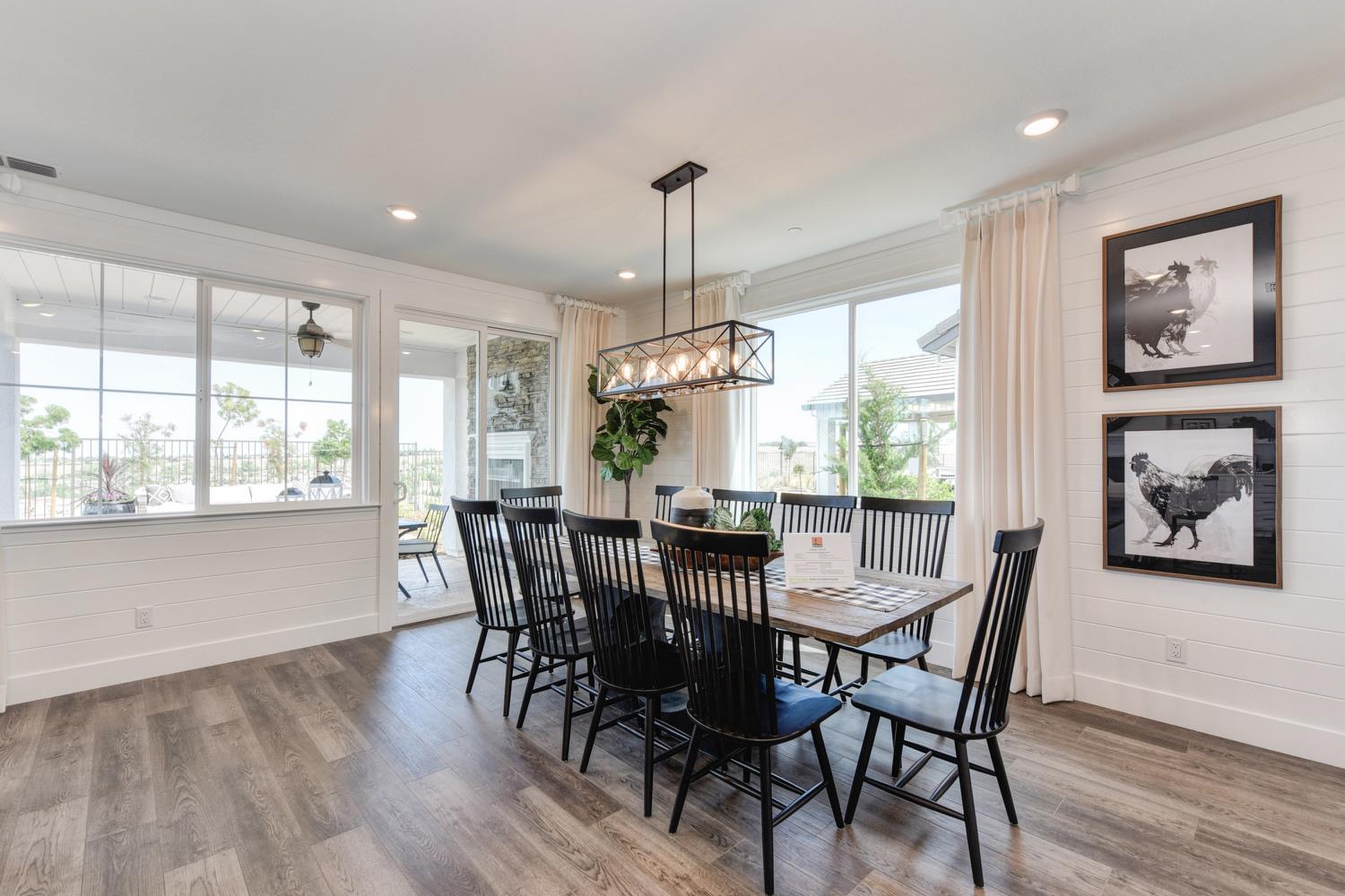 4080 Peter's Court Rocklin, CA 95765 - Photo 14 of 64 a view of a dining room with furniture window and wooden floor