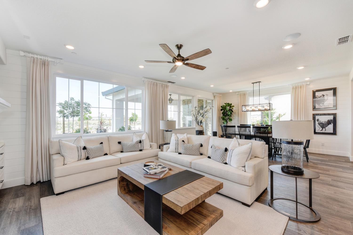 4080 Peter's Court Rocklin, CA 95765 - Photo 18 of 64 a living room with furniture ceiling fan and a large window