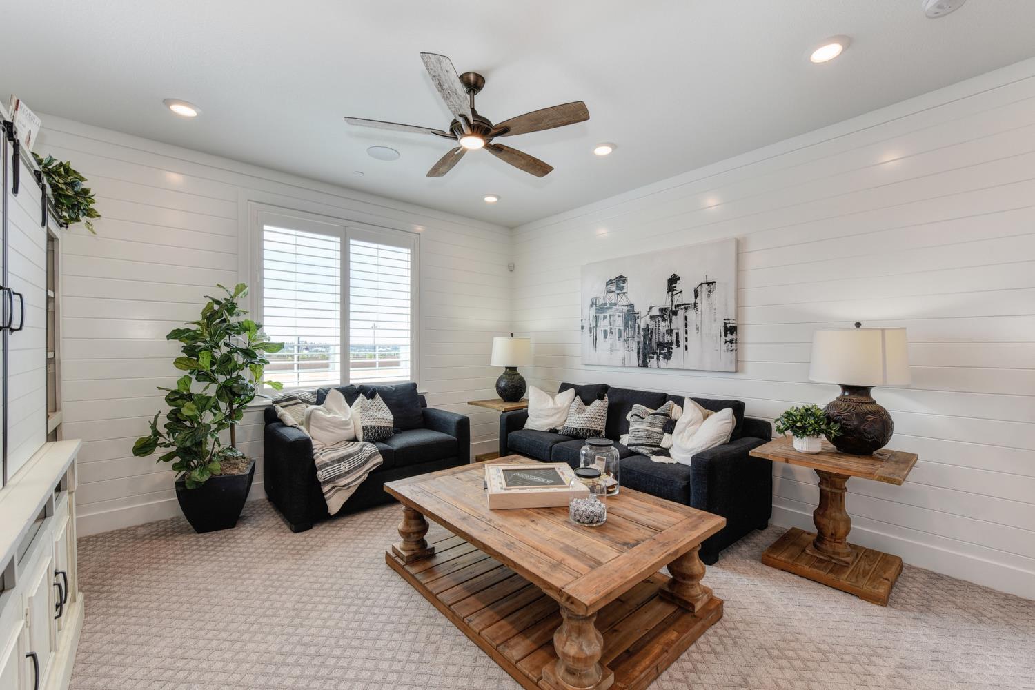 4080 Peter's Court Rocklin, CA 95765 - Photo 37 of 64 a living room with furniture a window and a potted plant