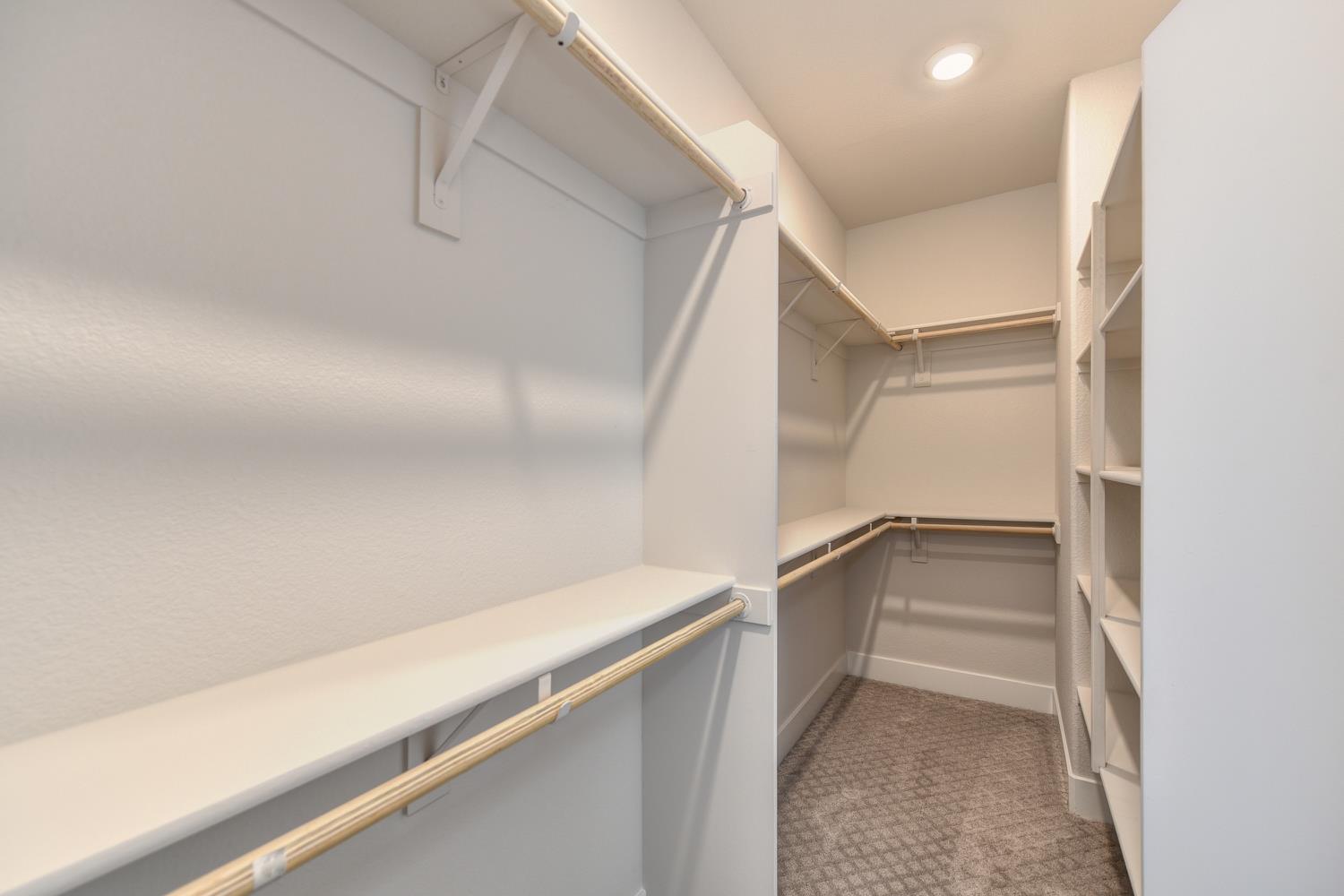 4080 Peter's Court Rocklin, CA 95765 - Photo 52 of 64 a view of walk in closet with empty racks