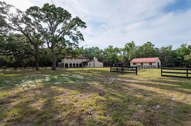 a kitchen with stainless steel appliances cabinets a sink and a window