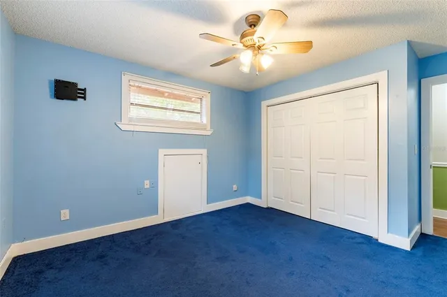 a view of a bench in a backyard