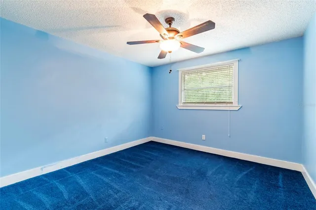 a view of road with trees