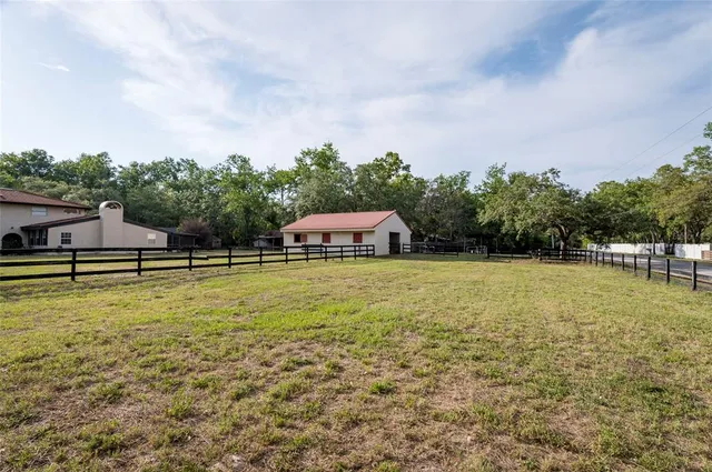 a kitchen with stainless steel appliances granite countertop a refrigerator and sink