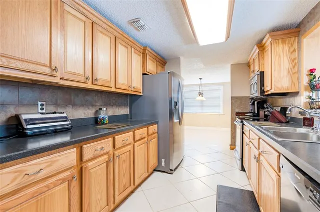 a view of an entryway with wooden floor and stairs