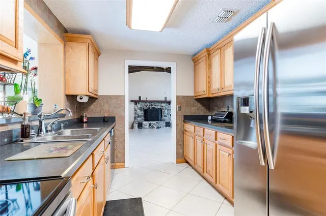 a view of an entryway with wooden floor and windows