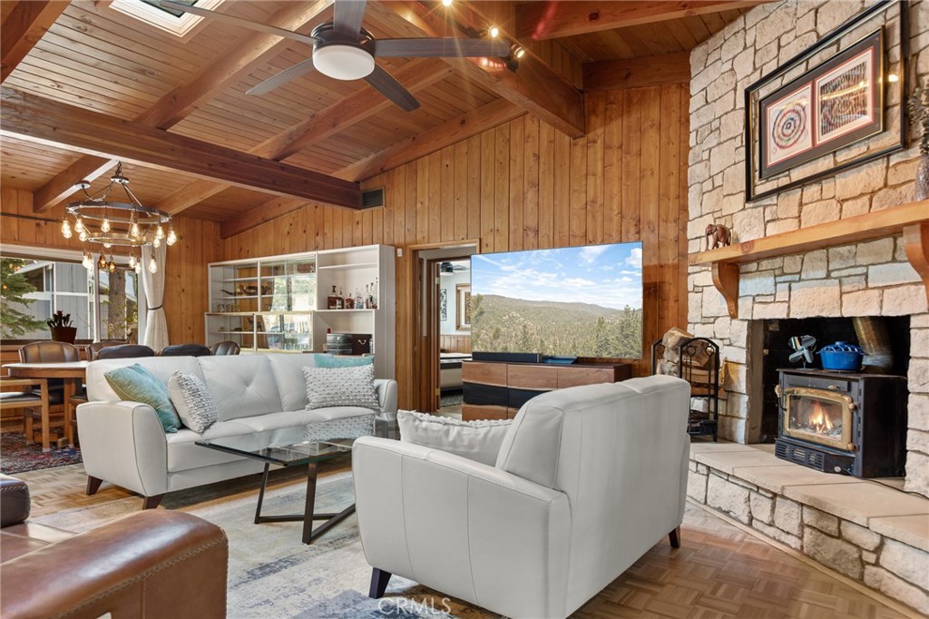 31466 Frontier Drive Running Springs, CA 92382 - Photo 16 of 43 a living room with furniture and a fireplace