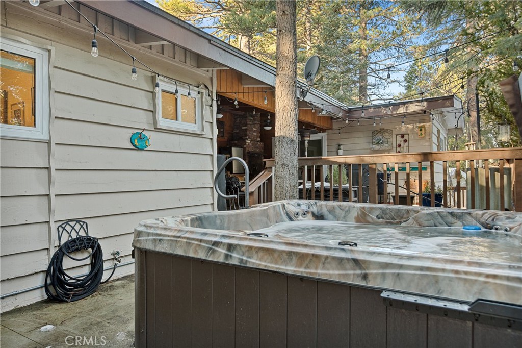 31466 Frontier Drive Running Springs, CA 92382 - Photo 21 of 43 a view of a house with a patio