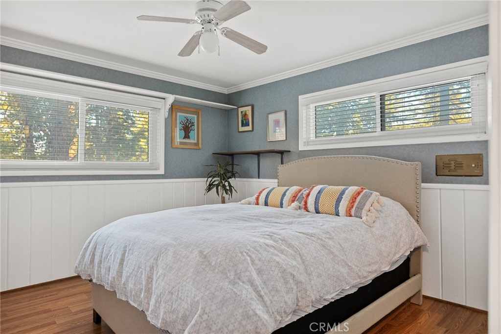 31466 Frontier Drive Running Springs, CA 92382 - Photo 23 of 43 a bed sitting in a bedroom next to a window