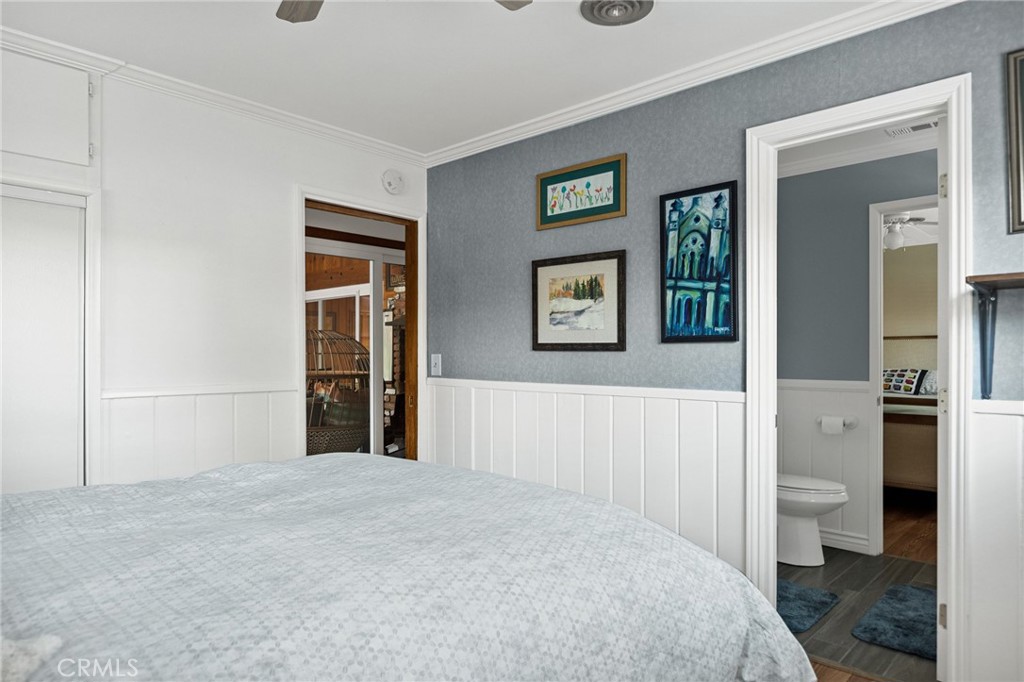 31466 Frontier Drive Running Springs, CA 92382 - Photo 25 of 43 a bedroom with a bed and a view of bathroom