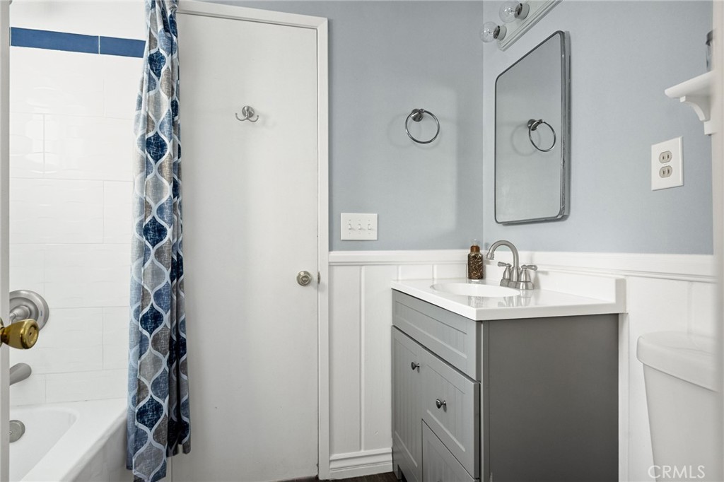 31466 Frontier Drive Running Springs, CA 92382 - Photo 27 of 43 a bathroom with a sink and a mirror