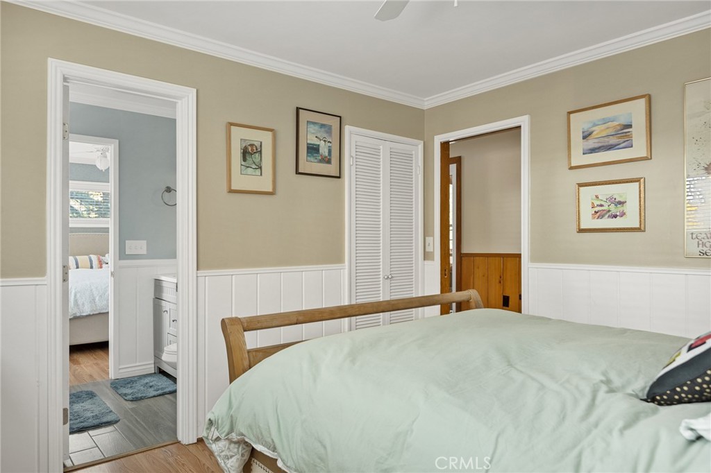 31466 Frontier Drive Running Springs, CA 92382 - Photo 29 of 43 a bedroom with a bed and a window