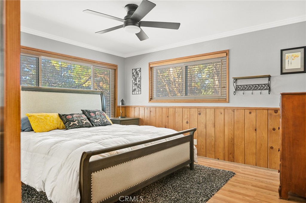 31466 Frontier Drive Running Springs, CA 92382 - Photo 34 of 43 a bedroom with a bed and a window