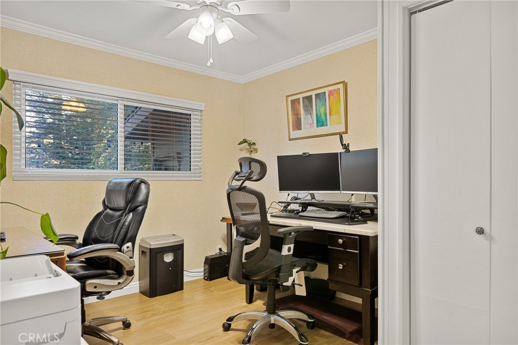 31466 Frontier Drive Running Springs, CA 92382 - Photo 37 of 43 a view of a workspace with furniture and a window