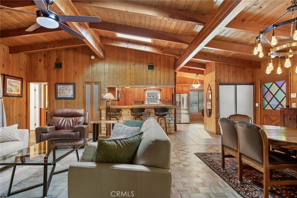 31466 Frontier Drive Running Springs, CA 92382 - Photo 6 of 43 a living room with furniture and a ceiling fan