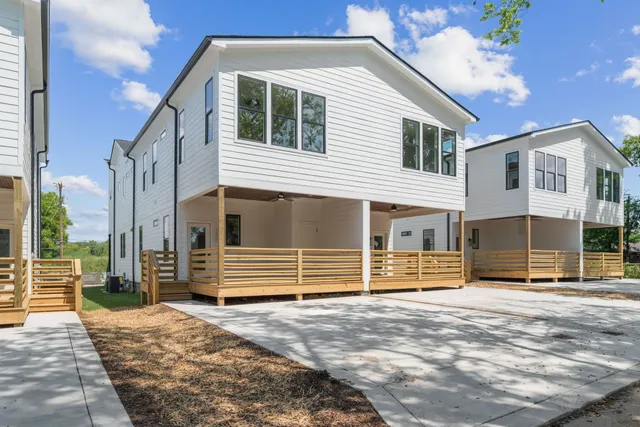 a front view of a house with a garage