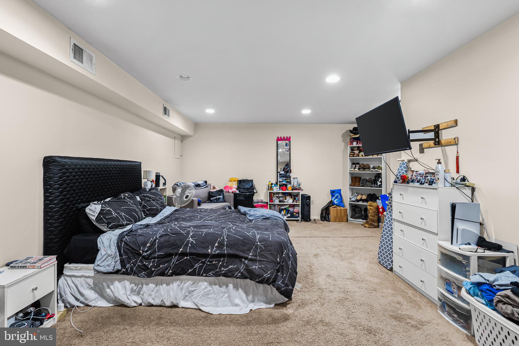 144 New Cedar Lane Hamilton, NJ 08610 - Photo 16 of 48 a bedroom with furniture and a couch