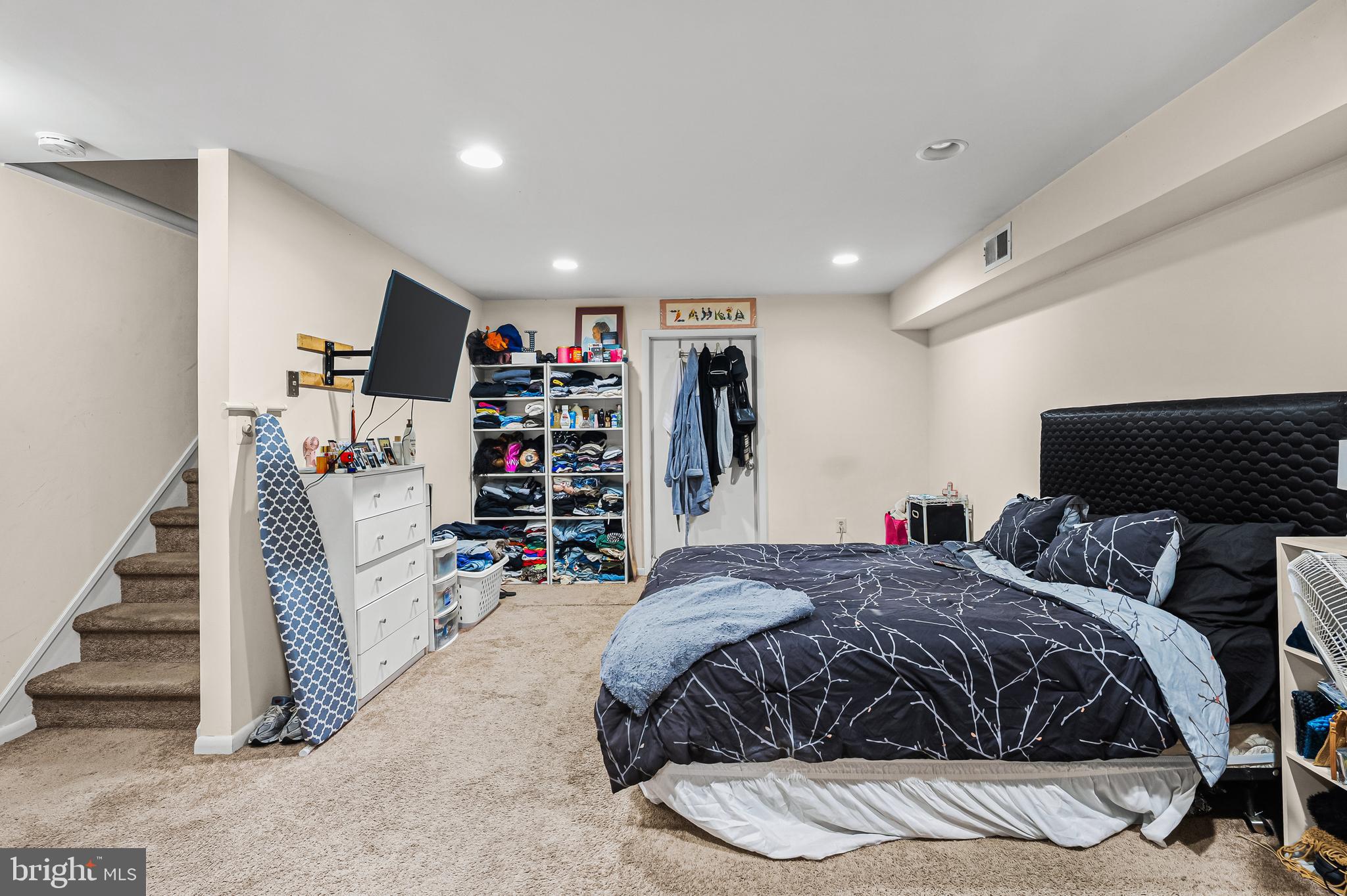144 New Cedar Lane Hamilton, NJ 08610 - Photo 18 of 48 a bedroom with a bed and a book shelf