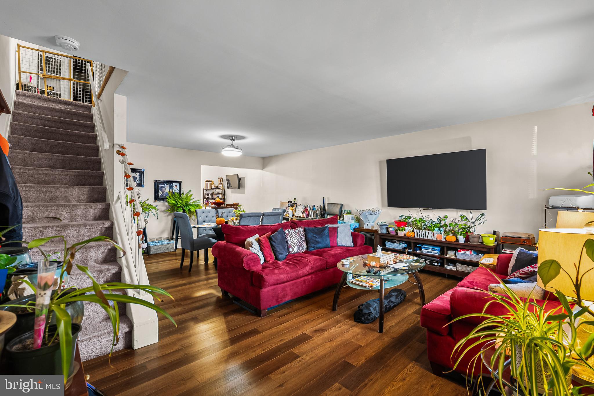 144 New Cedar Lane Hamilton, NJ 08610 - Photo 19 of 48 a living room with furniture and a flat screen tv