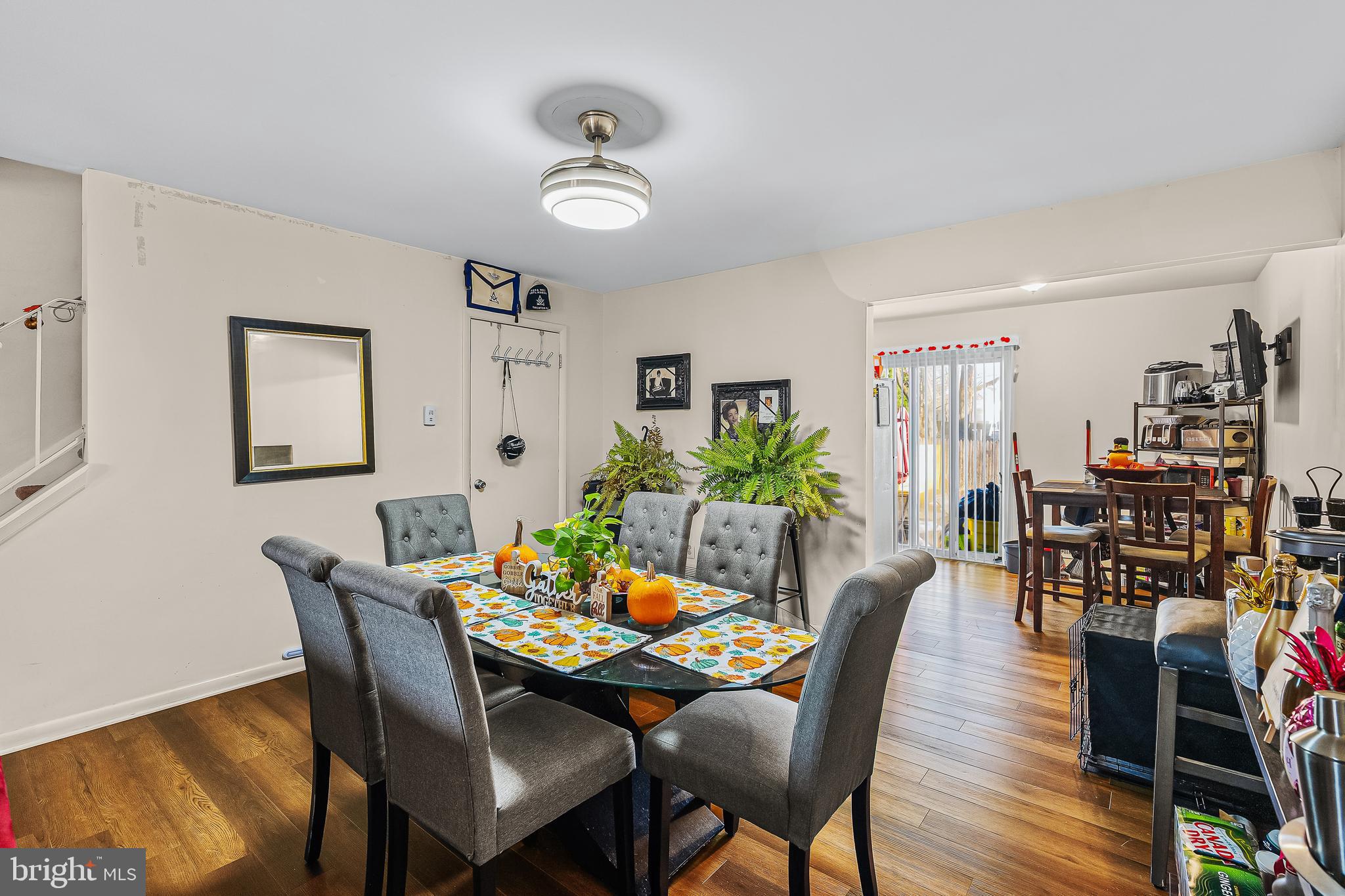 144 New Cedar Lane Hamilton, NJ 08610 - Photo 21 of 48 a dining room with furniture and wooden floor