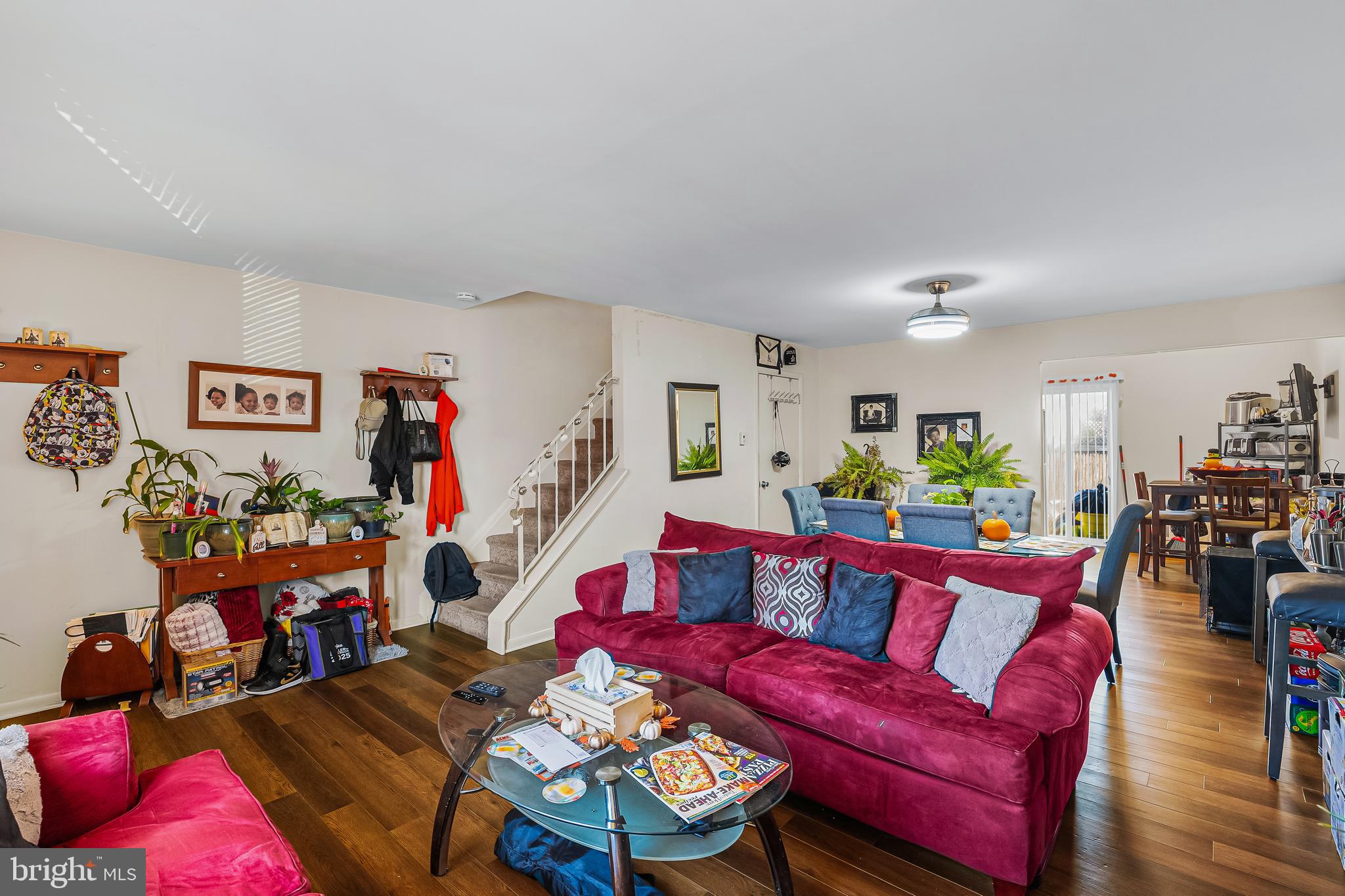 144 New Cedar Lane Hamilton, NJ 08610 - Photo 22 of 48 a living room with furniture a couch and a bookshelf