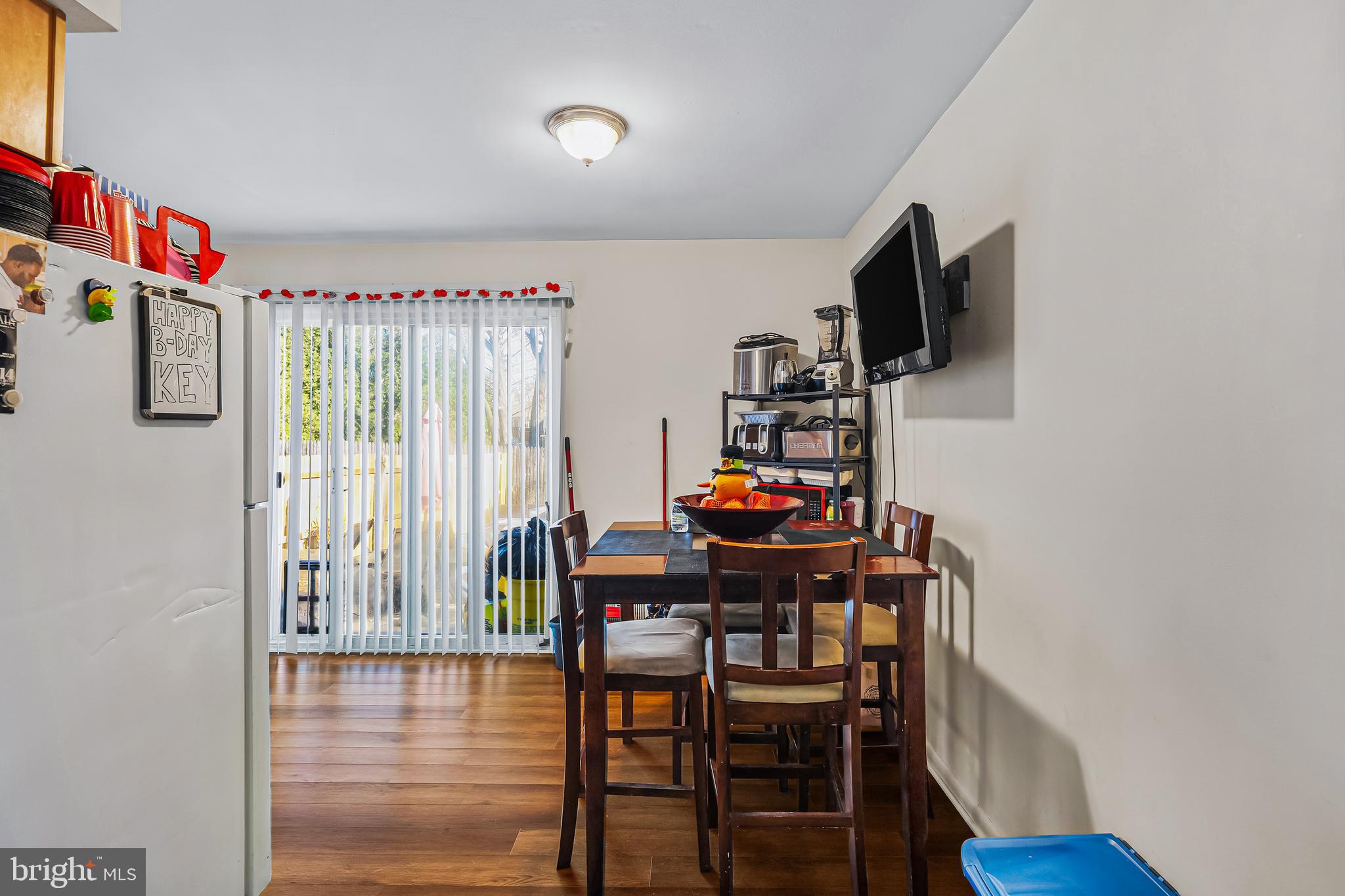 144 New Cedar Lane Hamilton, NJ 08610 - Photo 23 of 48 a view of a workspace with furniture and a flat screen tv