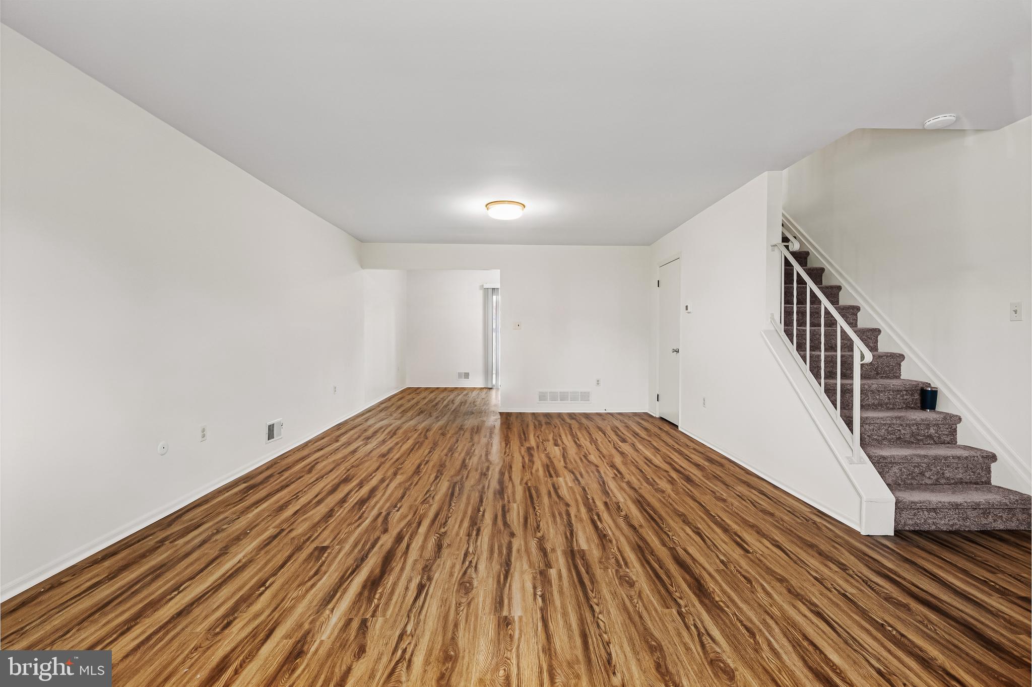 144 New Cedar Lane Hamilton, NJ 08610 - Photo 31 of 48 wooden floor in a hall with an entryway
