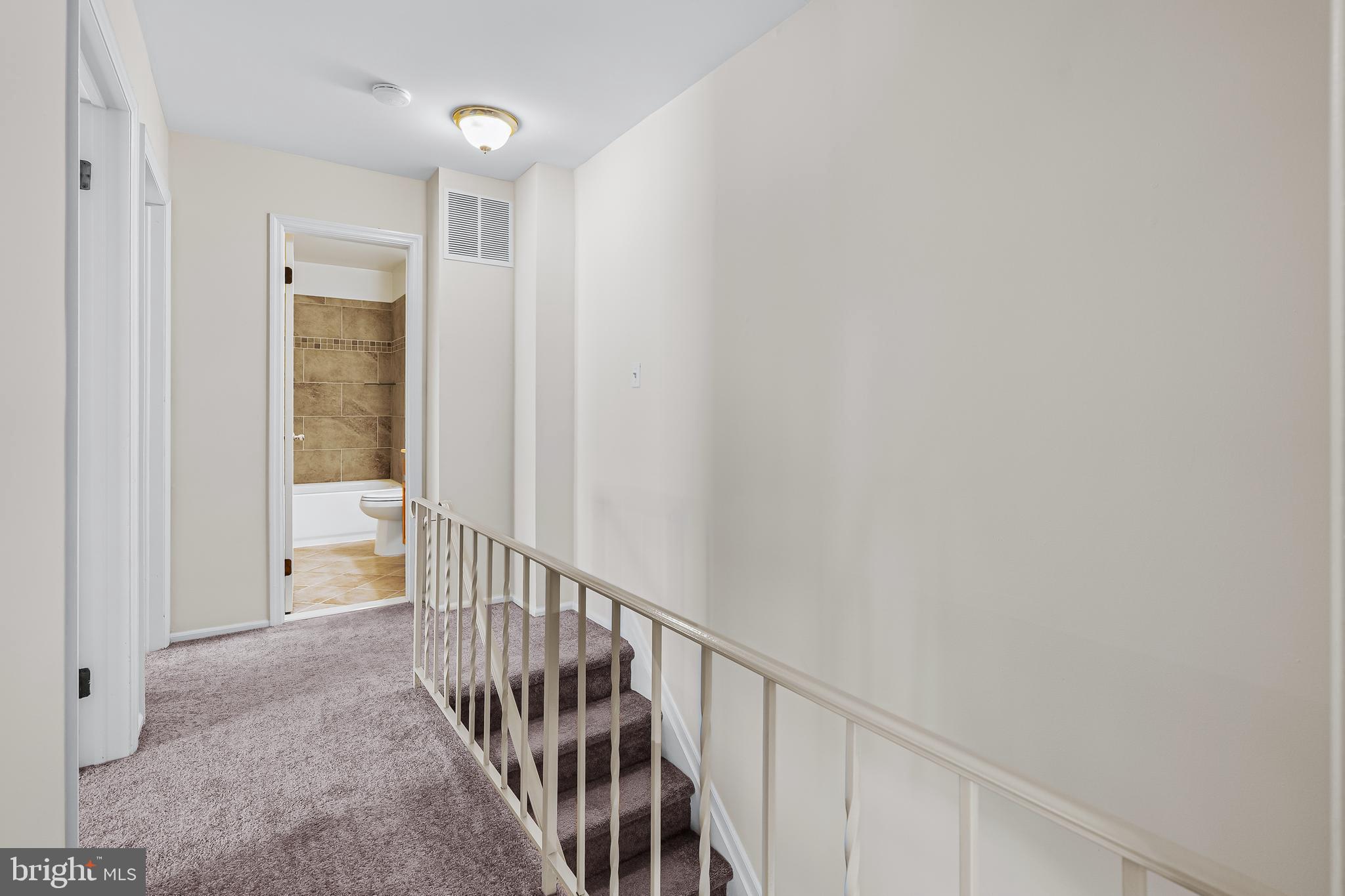 144 New Cedar Lane Hamilton, NJ 08610 - Photo 37 of 48 a view of hallway with stairs