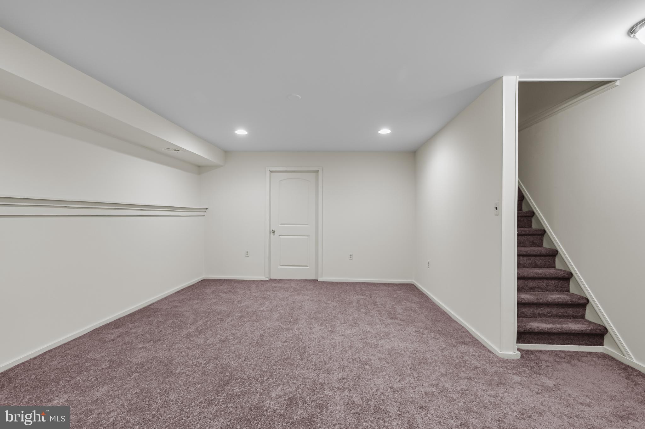 144 New Cedar Lane Hamilton, NJ 08610 - Photo 40 of 48 a view of an empty room with stairs