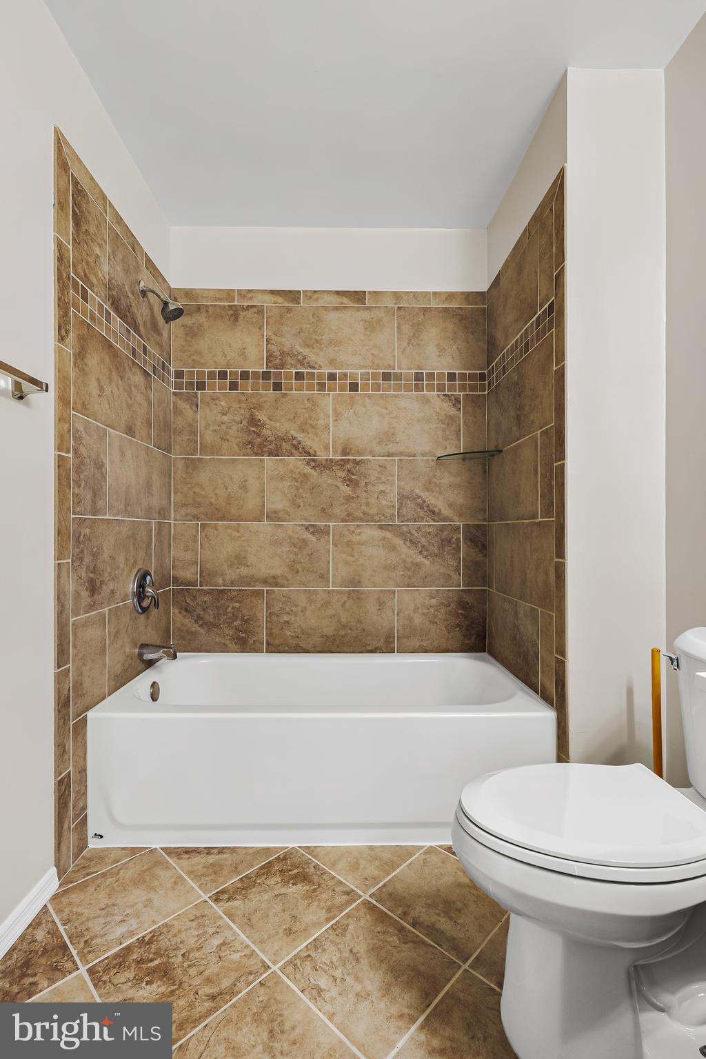 144 New Cedar Lane Hamilton, NJ 08610 - Photo 42 of 48 a bathroom with a bathtub and a toilet