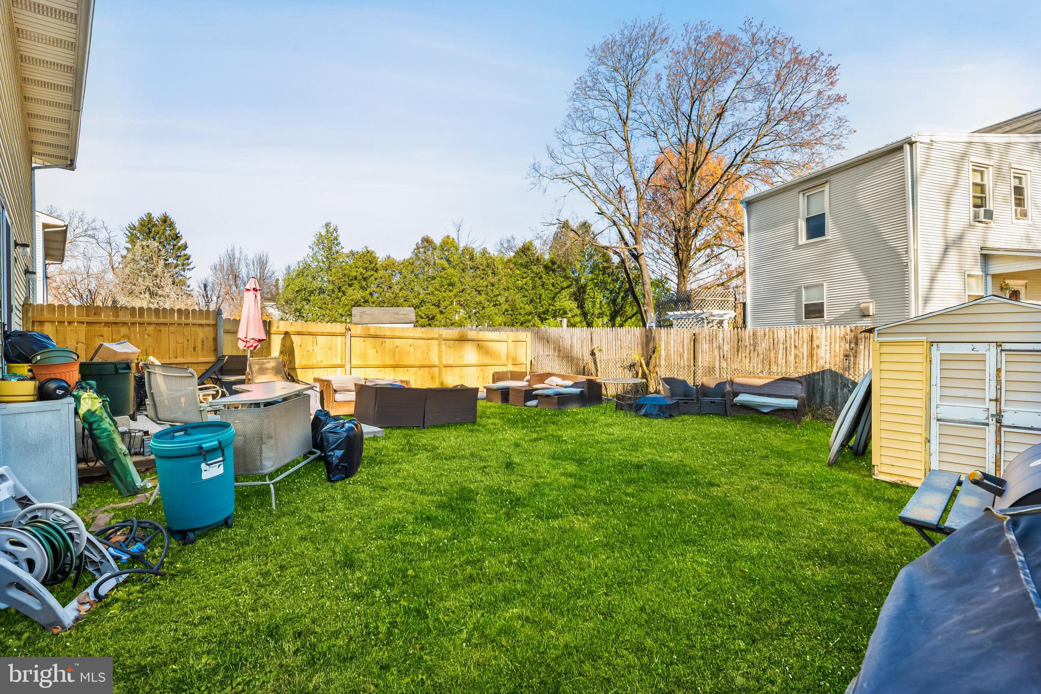 144 New Cedar Lane Hamilton, NJ 08610 - Photo 45 of 48 a view of backyard with swimming pool