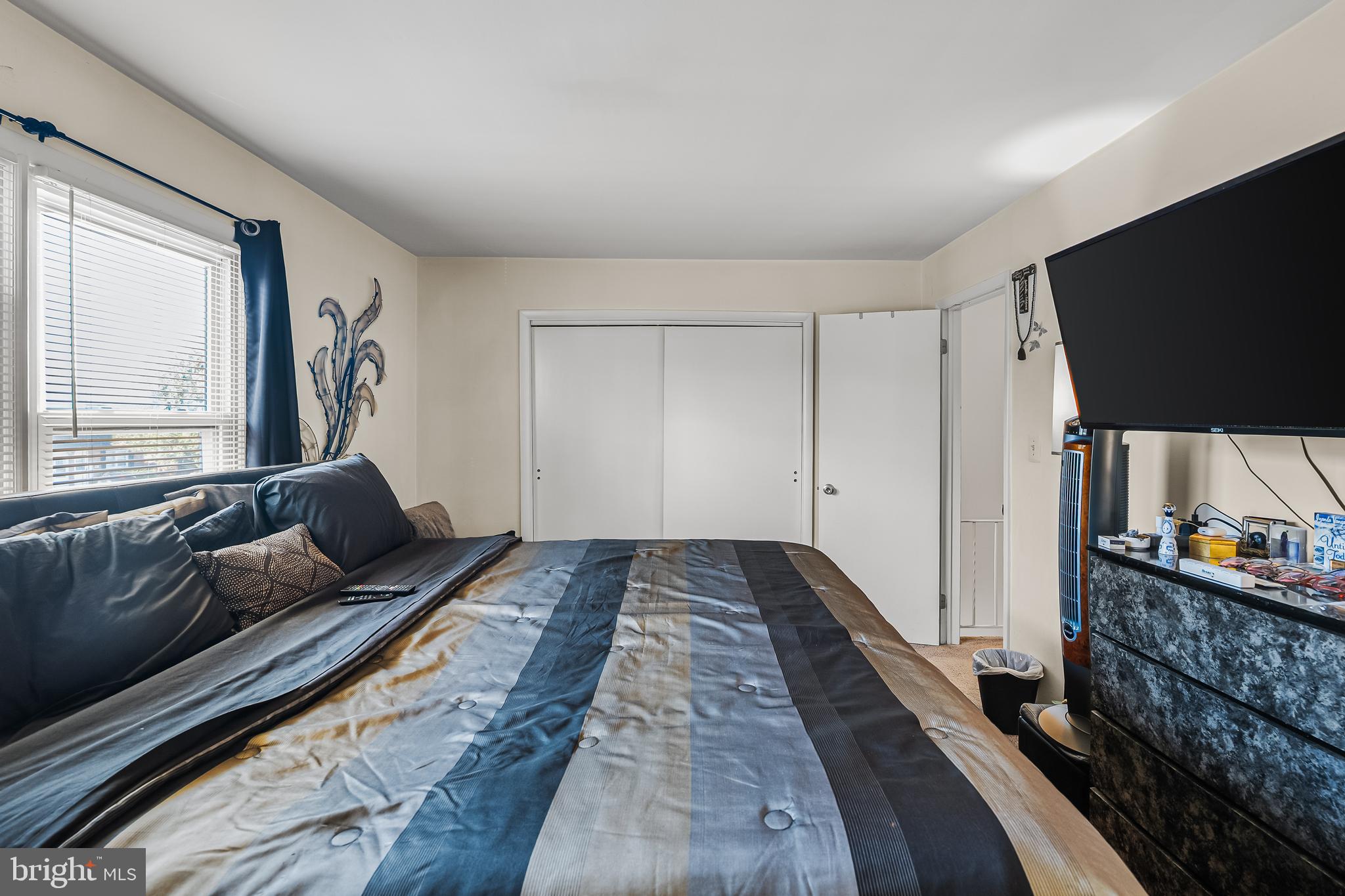 144 New Cedar Lane Hamilton, NJ 08610 - Photo 7 of 48 a living room with furniture and a flat screen tv