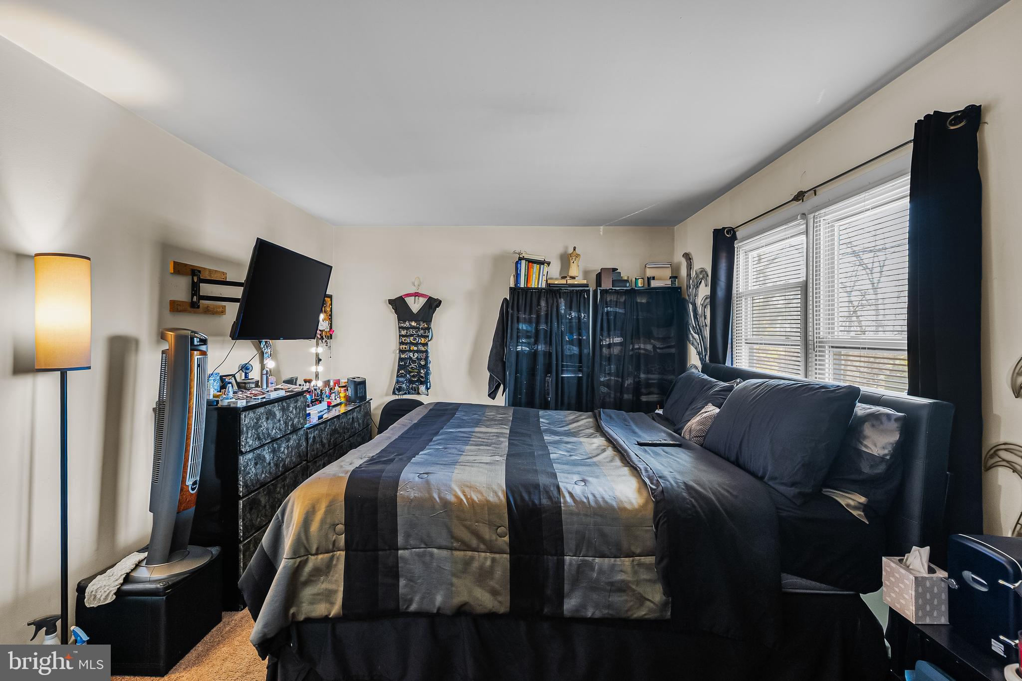 144 New Cedar Lane Hamilton, NJ 08610 - Photo 8 of 48 a bedroom with a bed tv and a window