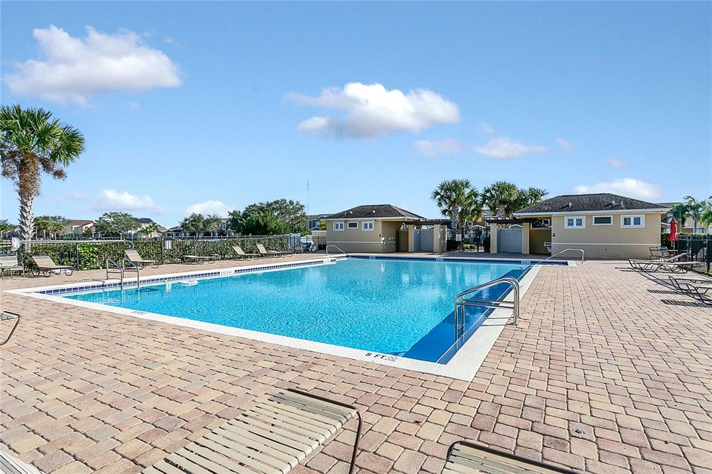 1621 Reflection Cove St. Cloud, FL 34771 - Photo 25 of 35 a view of swimming pool with a yard