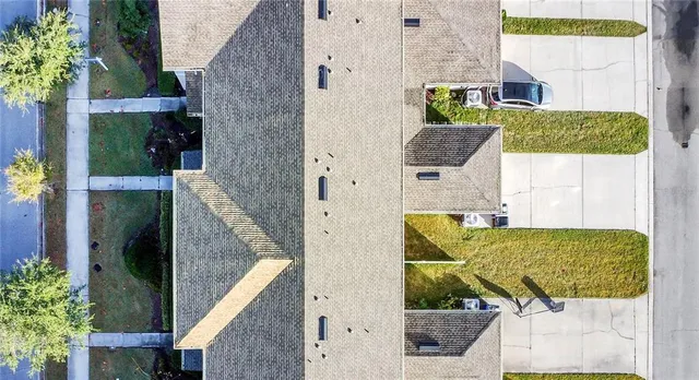 aerial view of a house and outdoor space