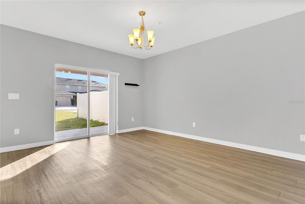 1621 Reflection Cove St. Cloud, FL 34771 - Photo 9 of 35 a view of an empty room and window