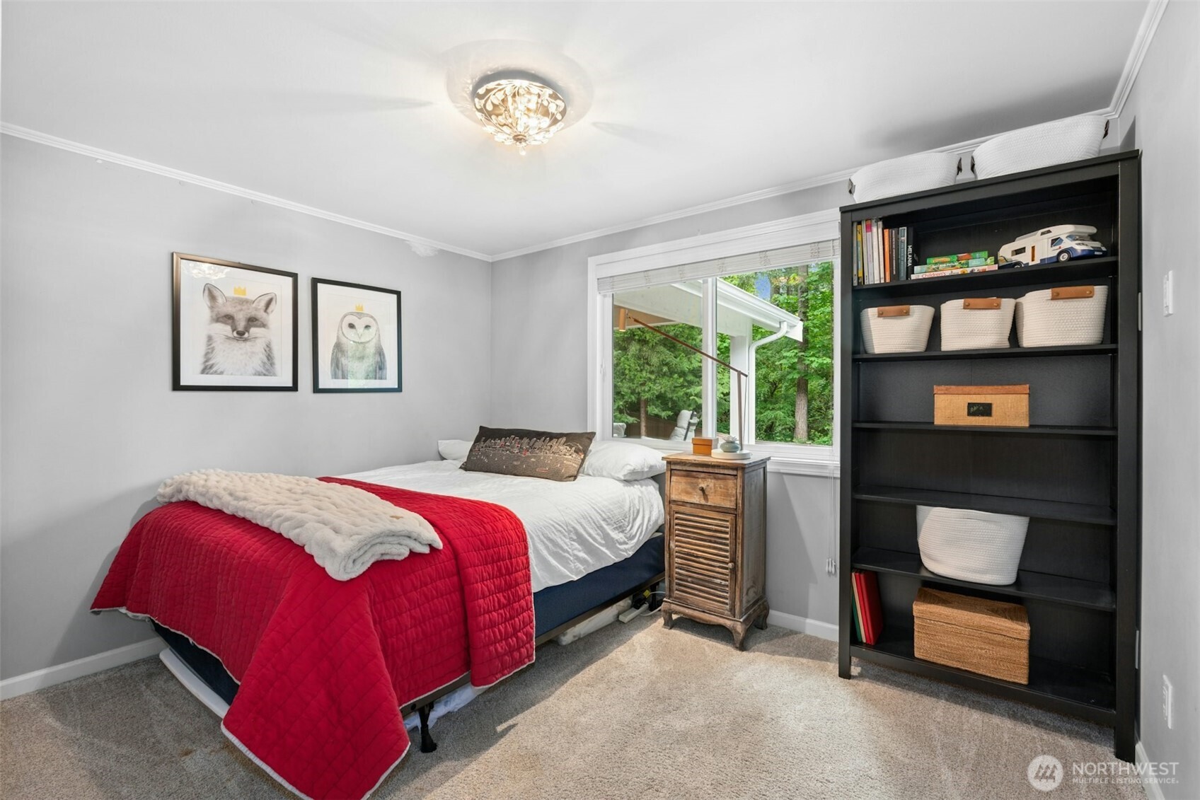 23307 49th Avenue Southeast Bothell, WA 98021 - Photo 18 of 37 a bedroom with a bed and a large window
