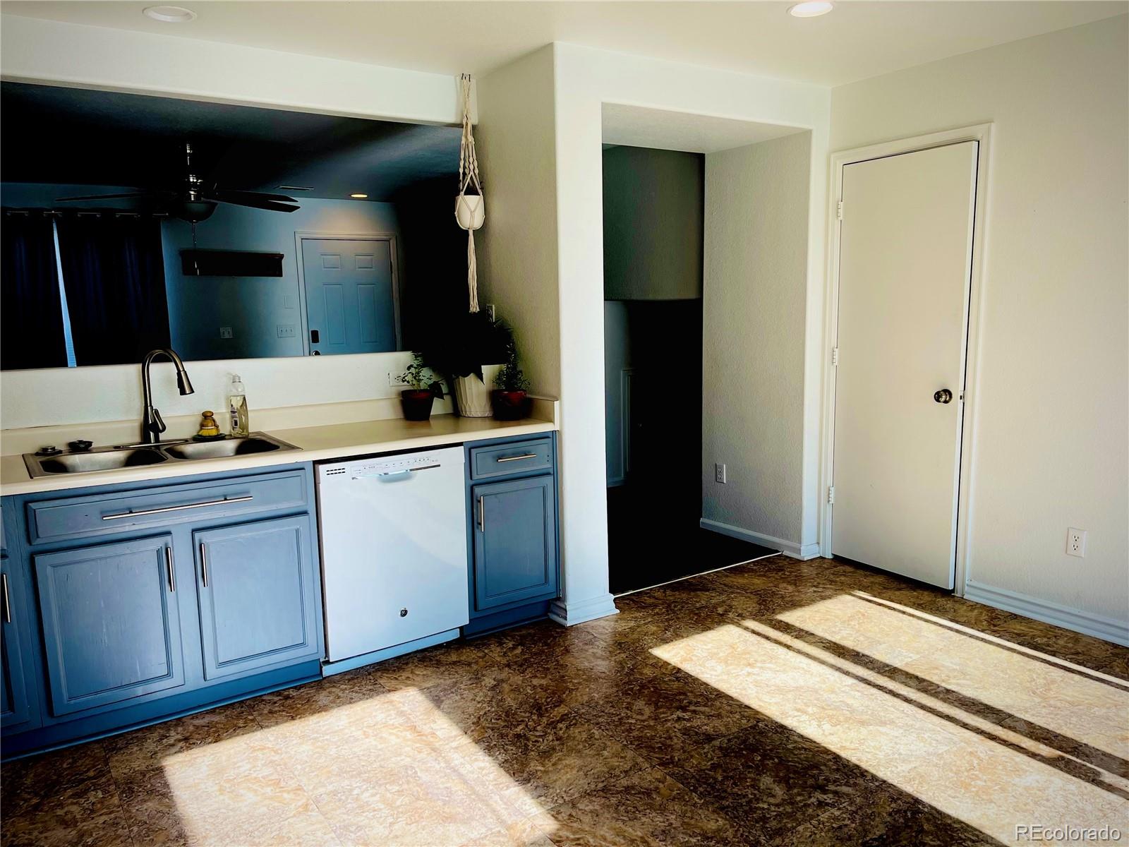 10100 Eudora Court Thornton, CO 80229 - Photo 4 of 17 a bathroom with a sink and a mirror