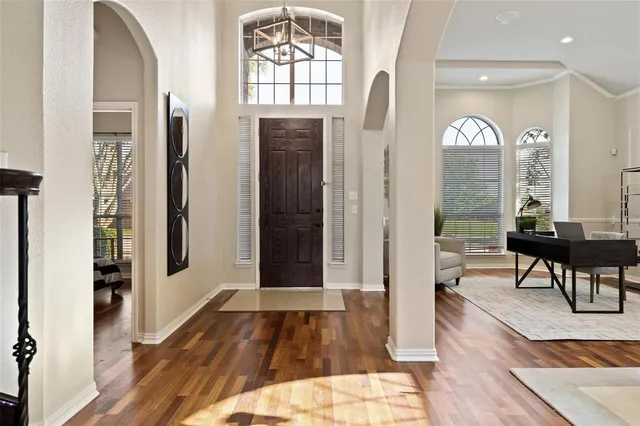 a view of a livingroom with furniture and window