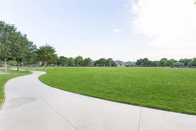 a view of a golf course with a garden