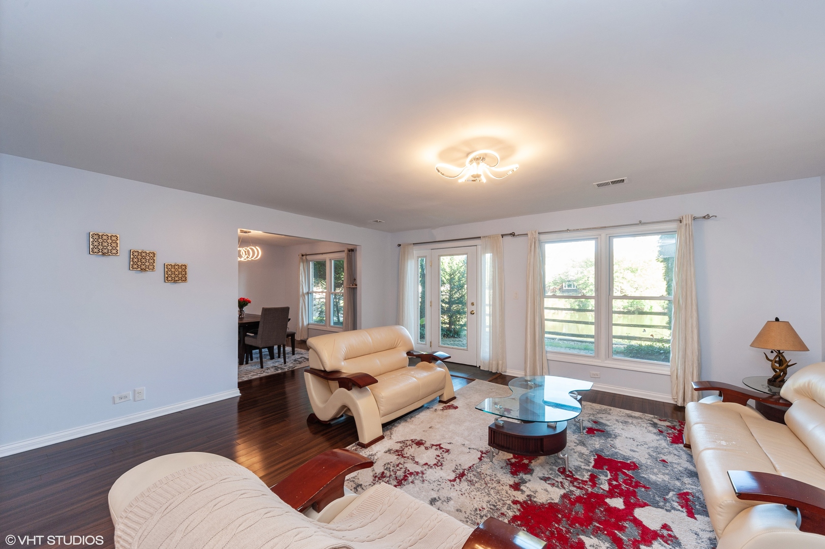 117 Rivershire Lane Lincolnshire, IL 60069 - Photo 5 of 19 a living room with furniture and wooden floor