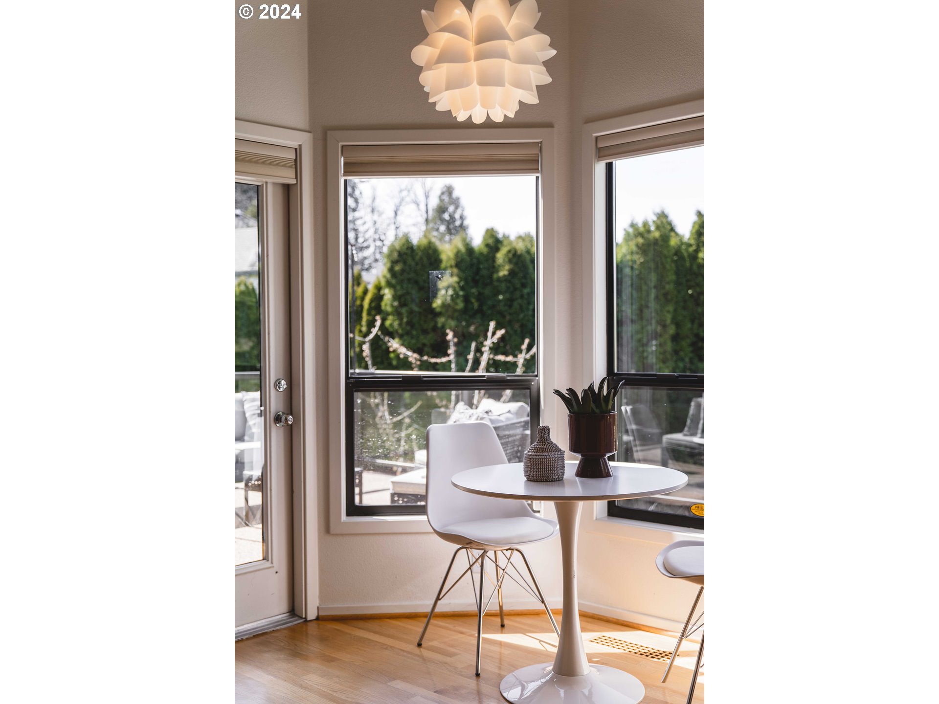 7179 Southwest Arranmore Way Portland, OR 97223 - Photo 16 of 48 a dining room with a table and chairs