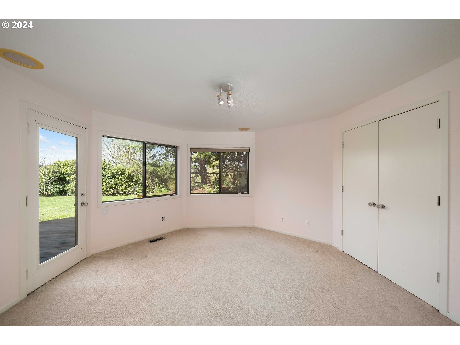 7179 Southwest Arranmore Way Portland, OR 97223 - Photo 27 of 48 a view of an empty room with a window