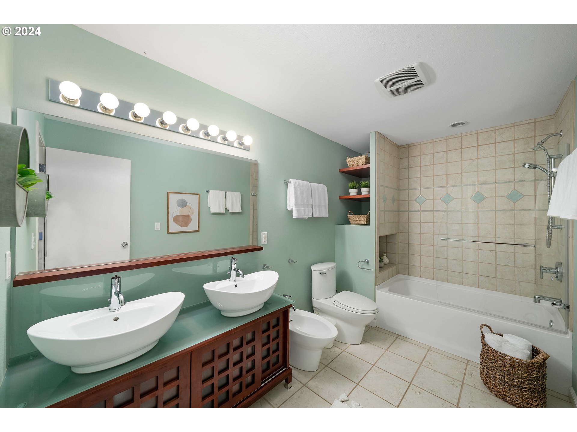 7179 Southwest Arranmore Way Portland, OR 97223 - Photo 29 of 48 a bathroom with a sink a toilet a mirror and shower