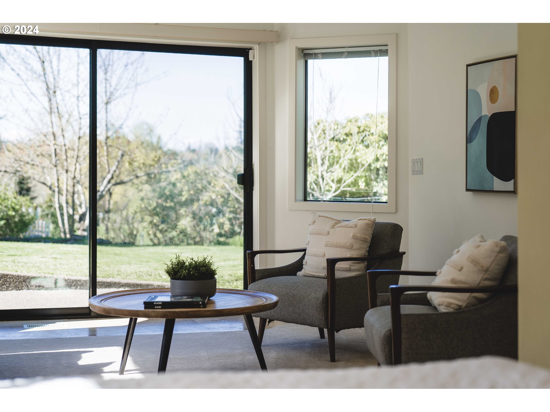 7179 Southwest Arranmore Way Portland, OR 97223 - Photo 31 of 48 a living room with furniture and a window