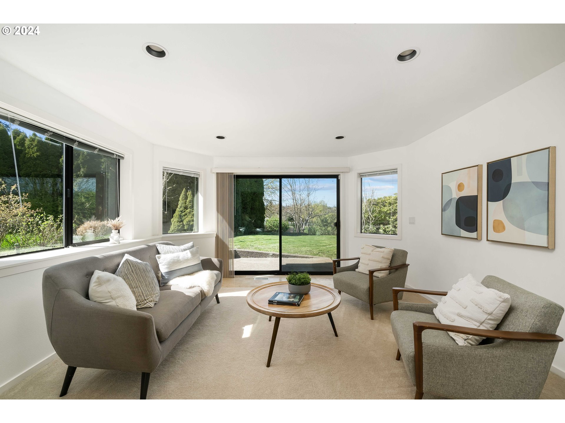 7179 Southwest Arranmore Way Portland, OR 97223 - Photo 33 of 48 a living room with furniture and a large window
