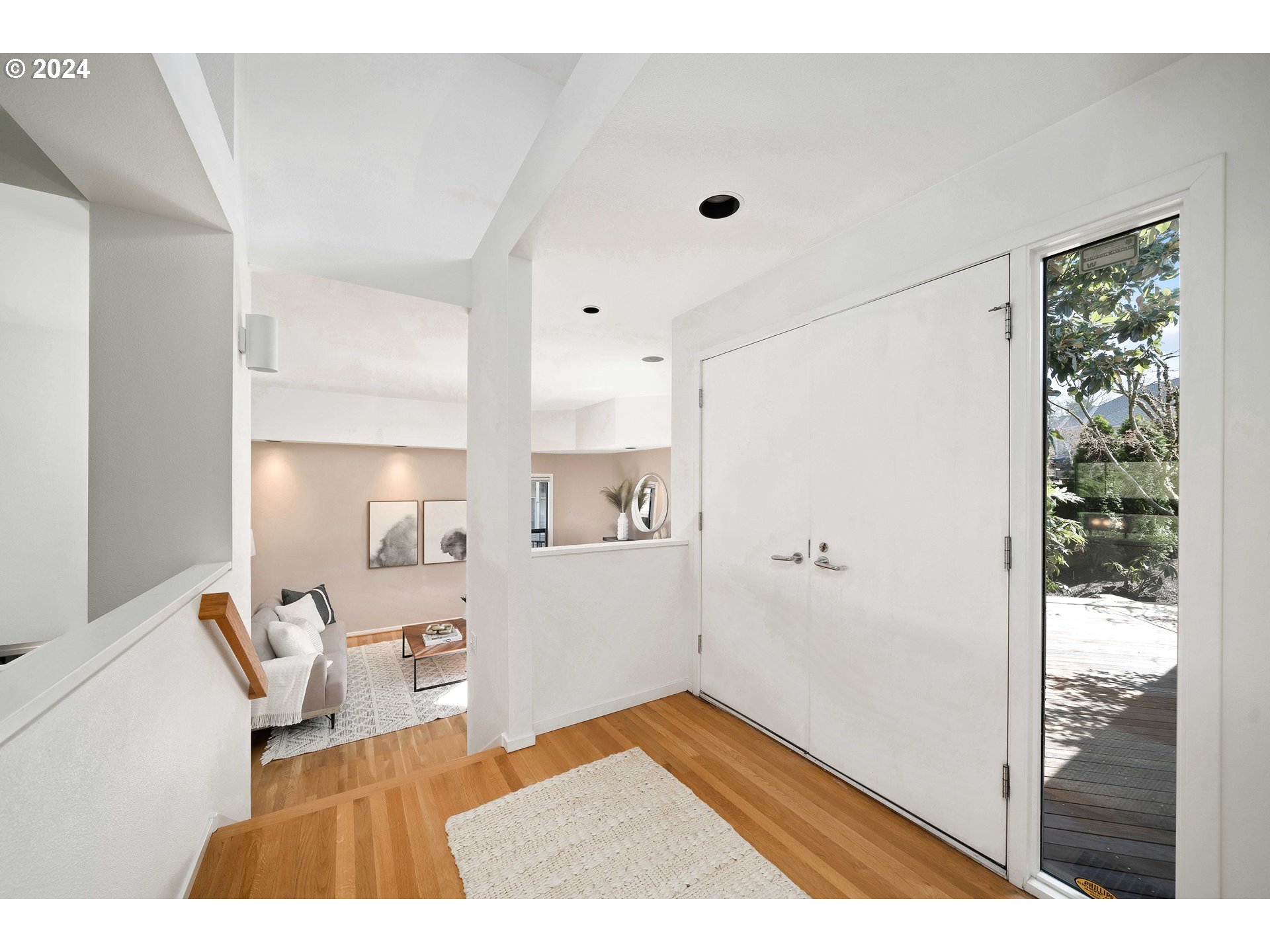 7179 Southwest Arranmore Way Portland, OR 97223 - Photo 4 of 48 a living room with a couch and a large window