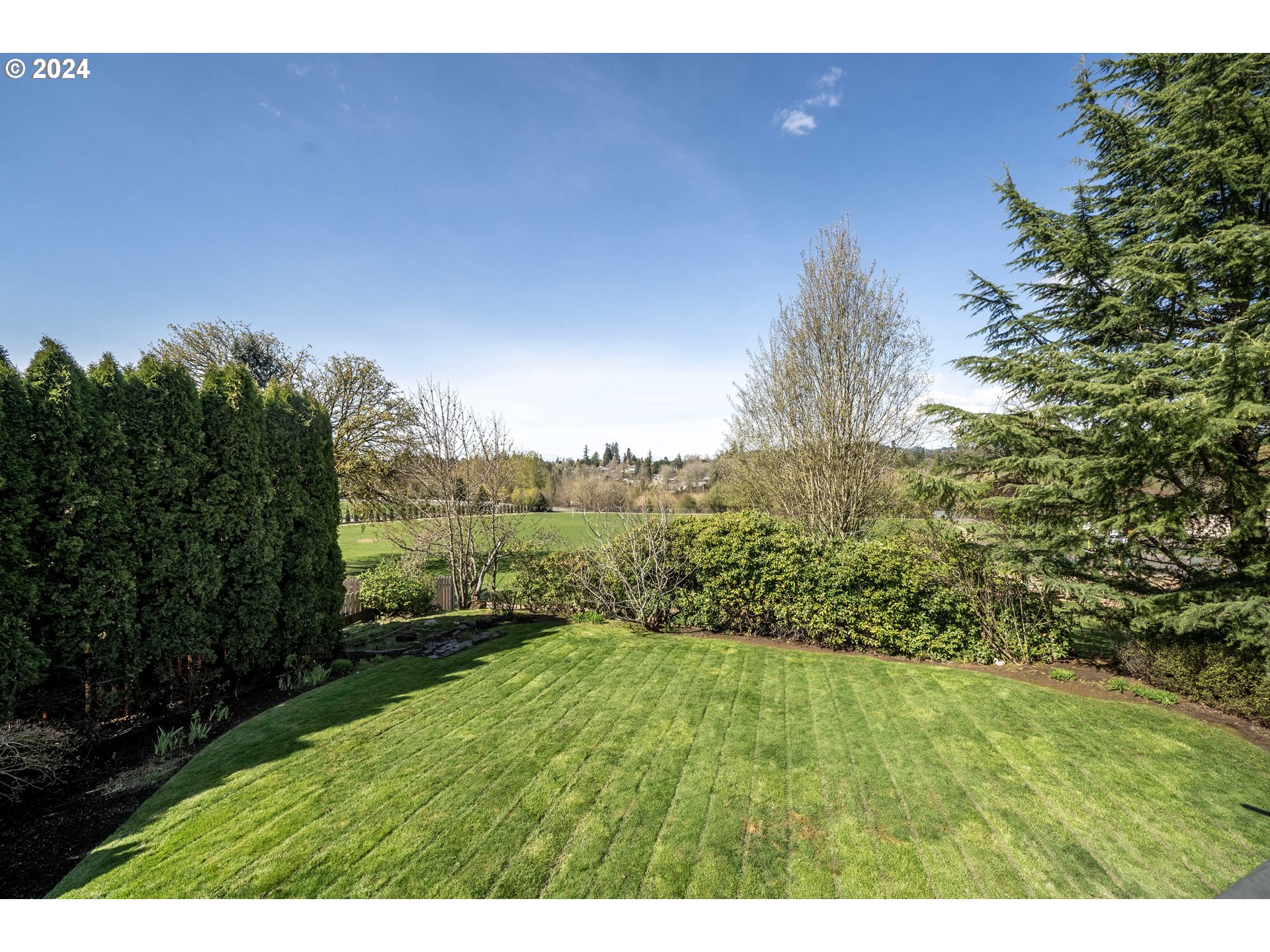 7179 Southwest Arranmore Way Portland, OR 97223 - Photo 41 of 48 a view of an outdoor space and a yard