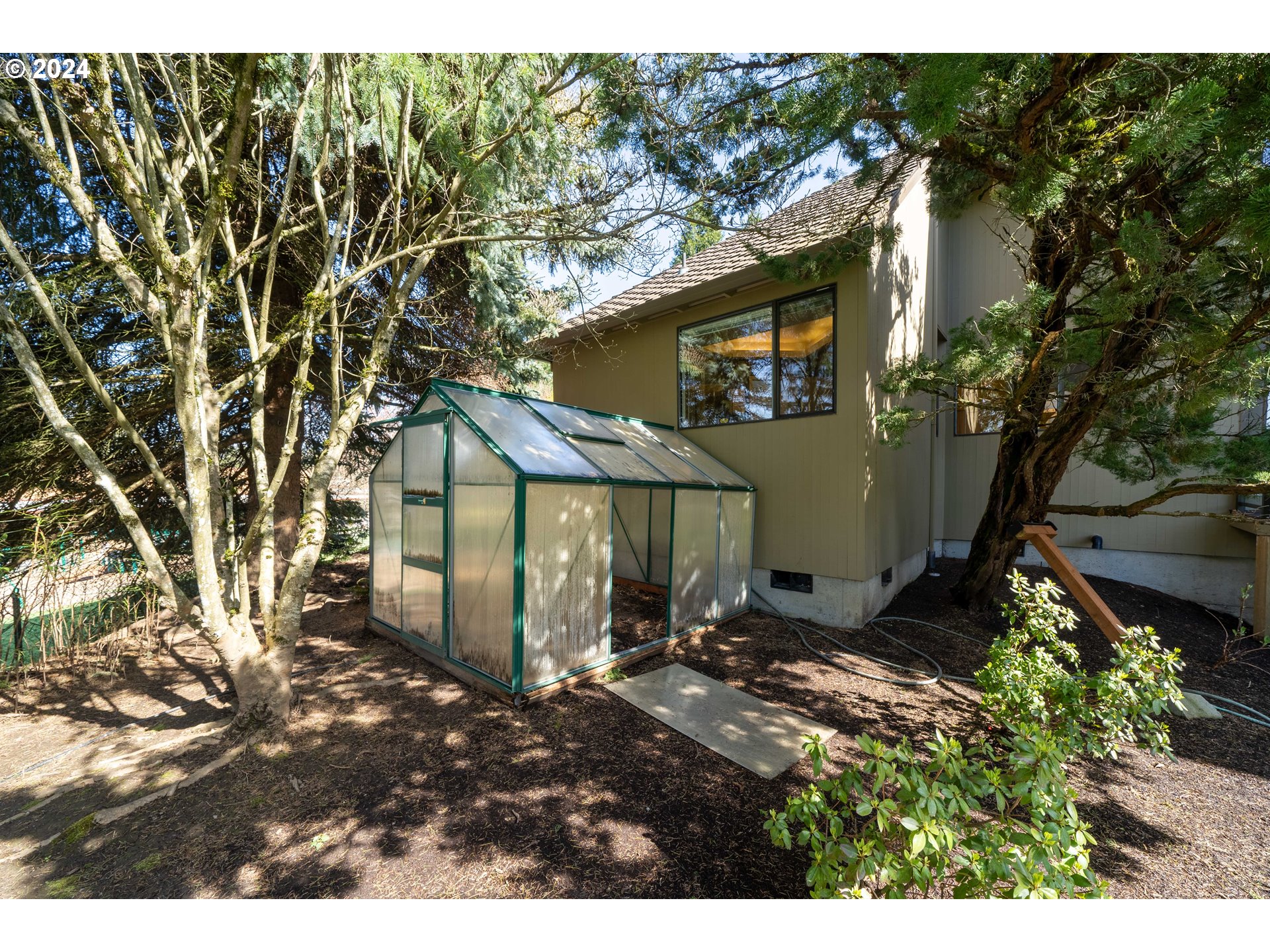7179 Southwest Arranmore Way Portland, OR 97223 - Photo 42 of 48 a backyard of a house with lots of green space